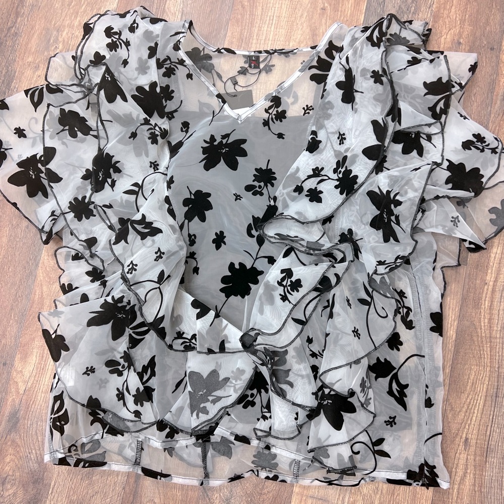 Black and white ruffle blouse